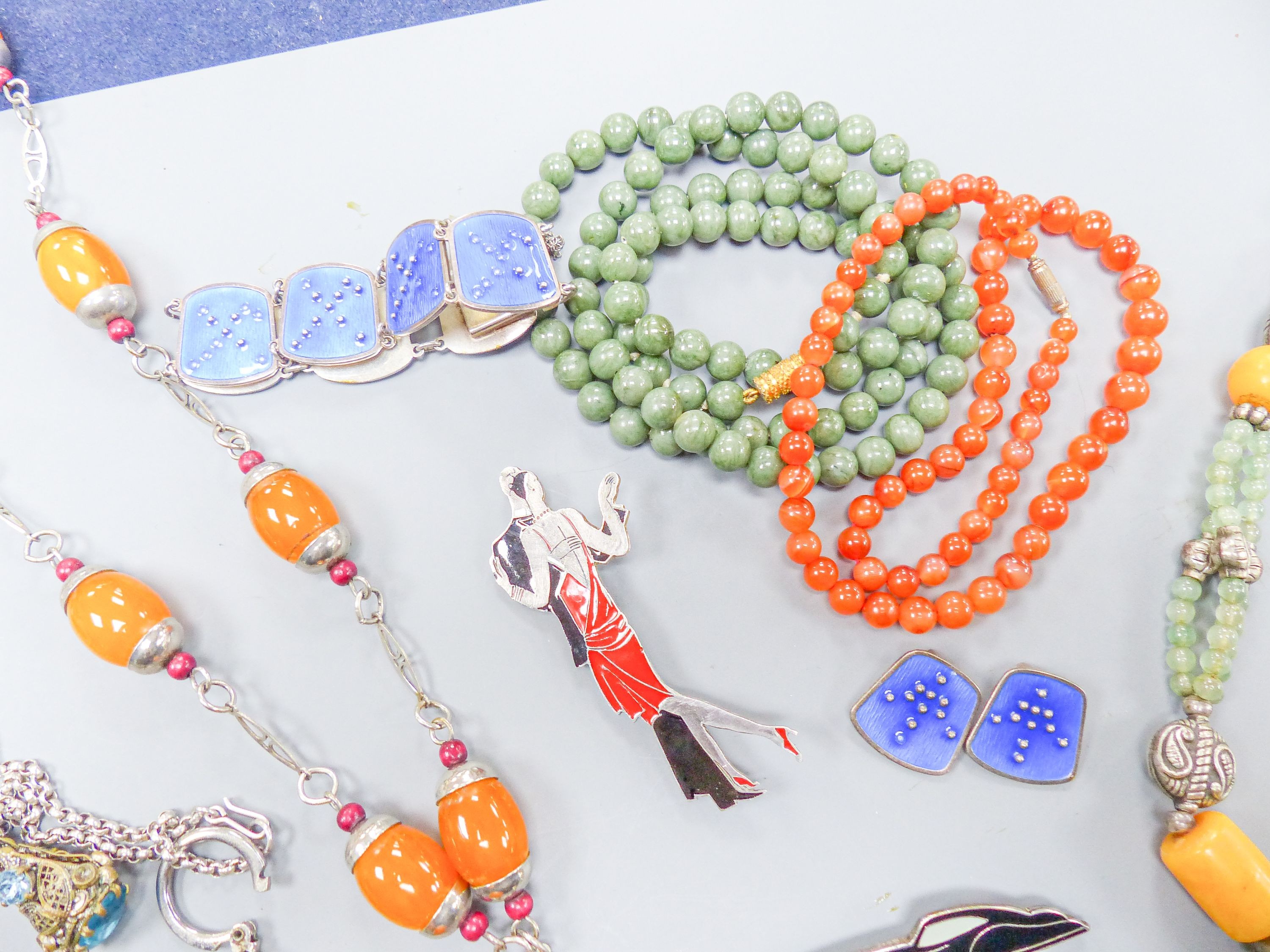 Assorted mainly costume jewellery including agate bead necklace and simulated amber necklace.